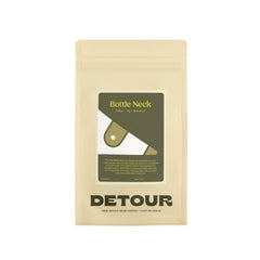 Detour Coffee Roaster Bottleneck Blend - Chocolate, Toffee, Fig Tasting Profile - Filter Balanced Coffee Style - Seasonal Celebration - Consistent Flavor Profile - Smooth Everyday Sipper - Creamy Texture - Approachable Complexity - Baby Raccoon Rescue Inspiration - Learn More on Our Website