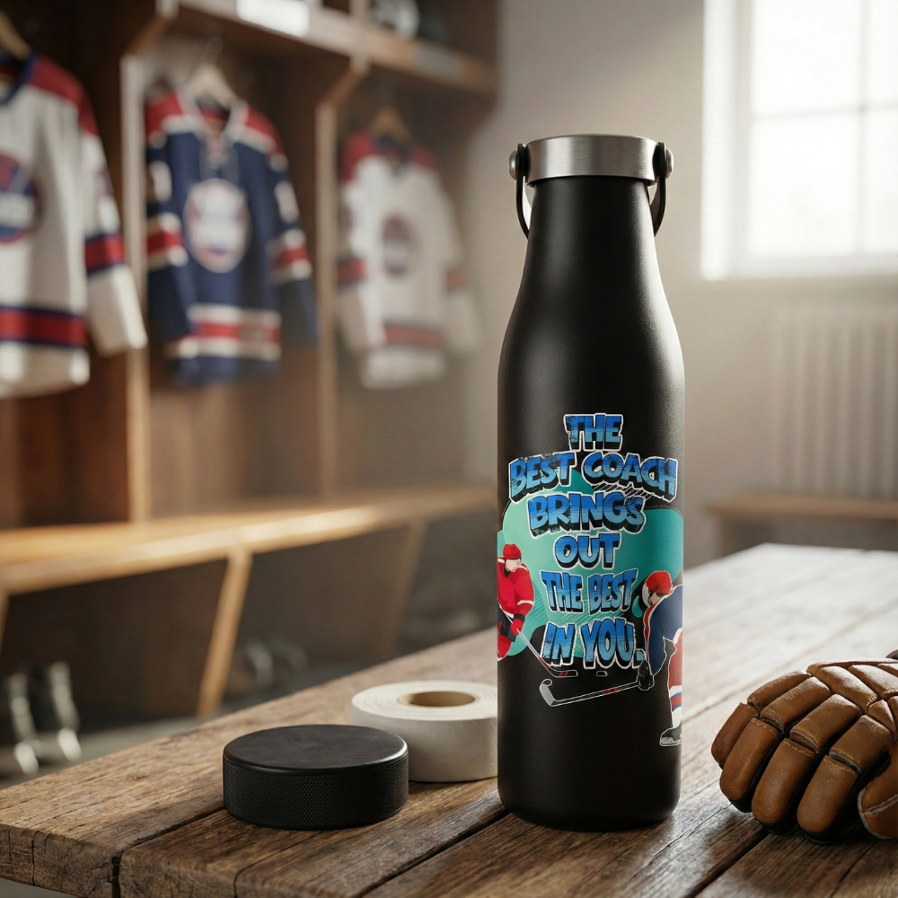 Black LAMOSE Robson 21oz water bottle featuring 'The Best Coach Brings Out The Best In You' design with hockey players, sitting on a bench with a puck and glove.