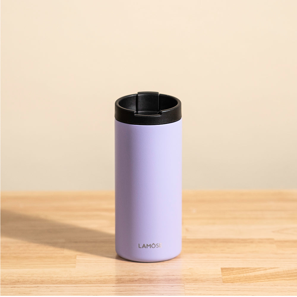 LAMOSE Grouse 12 oz insulated tumbler in lavender purple, front view. Features a black leakproof lid and stainless steel body.