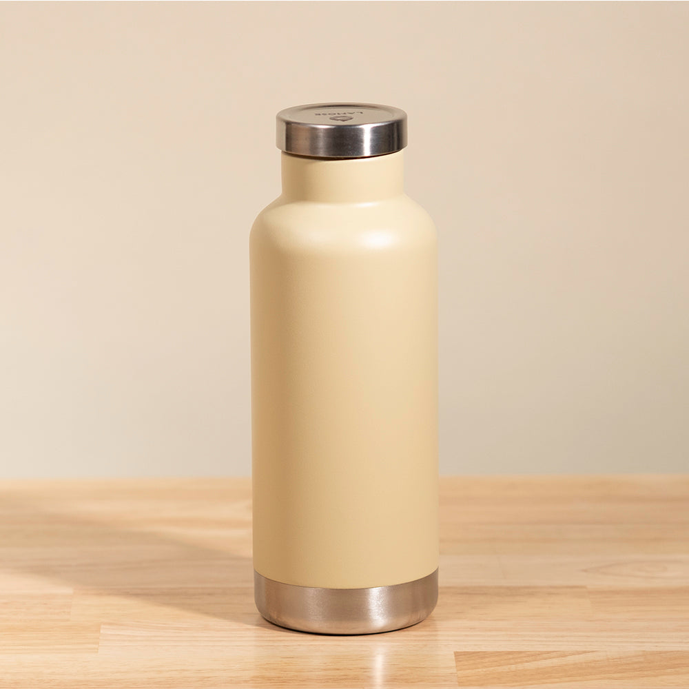 LAMOSE Moraine 20 oz insulated stainless steel bottle, sand color, matte finish, metal base and lid, front view.