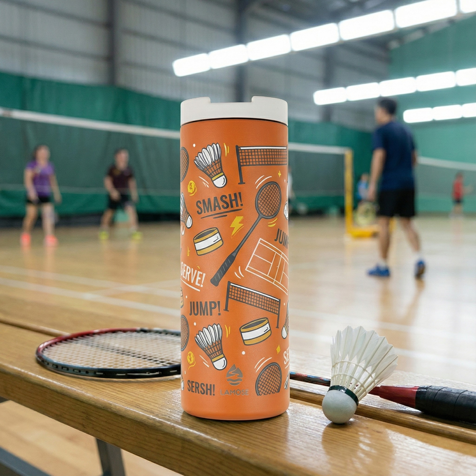 Orange Lamose Grouse 16 oz tumbler featuring a badminton pattern with rackets, shuttlecocks, nets, and the text SMASH and SERVE.