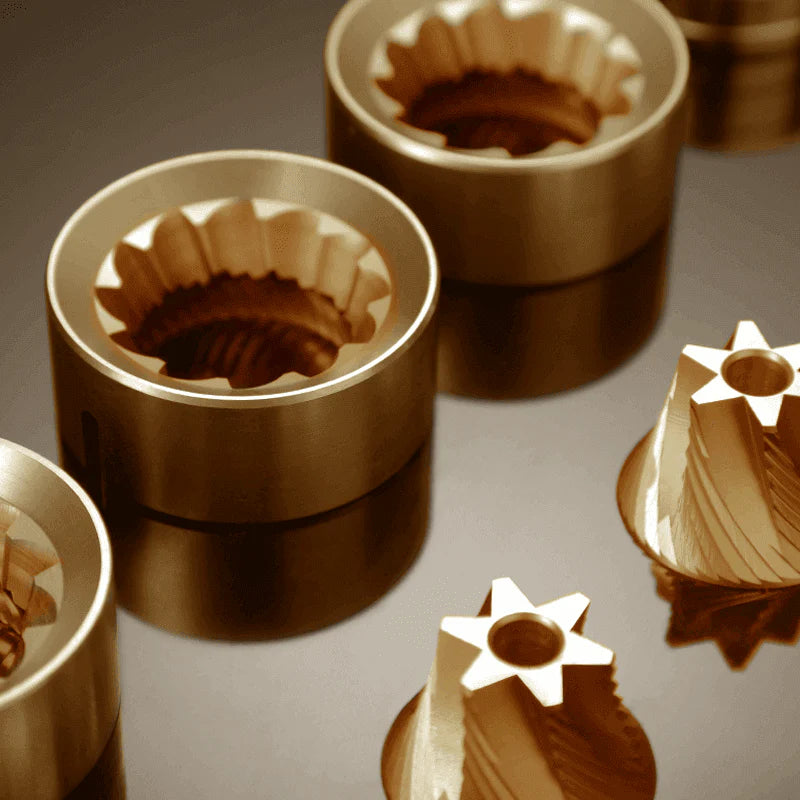 Precision-engineered golden titanium-coated coffee grinder burrs, designed for efficient and consistent grinding performance