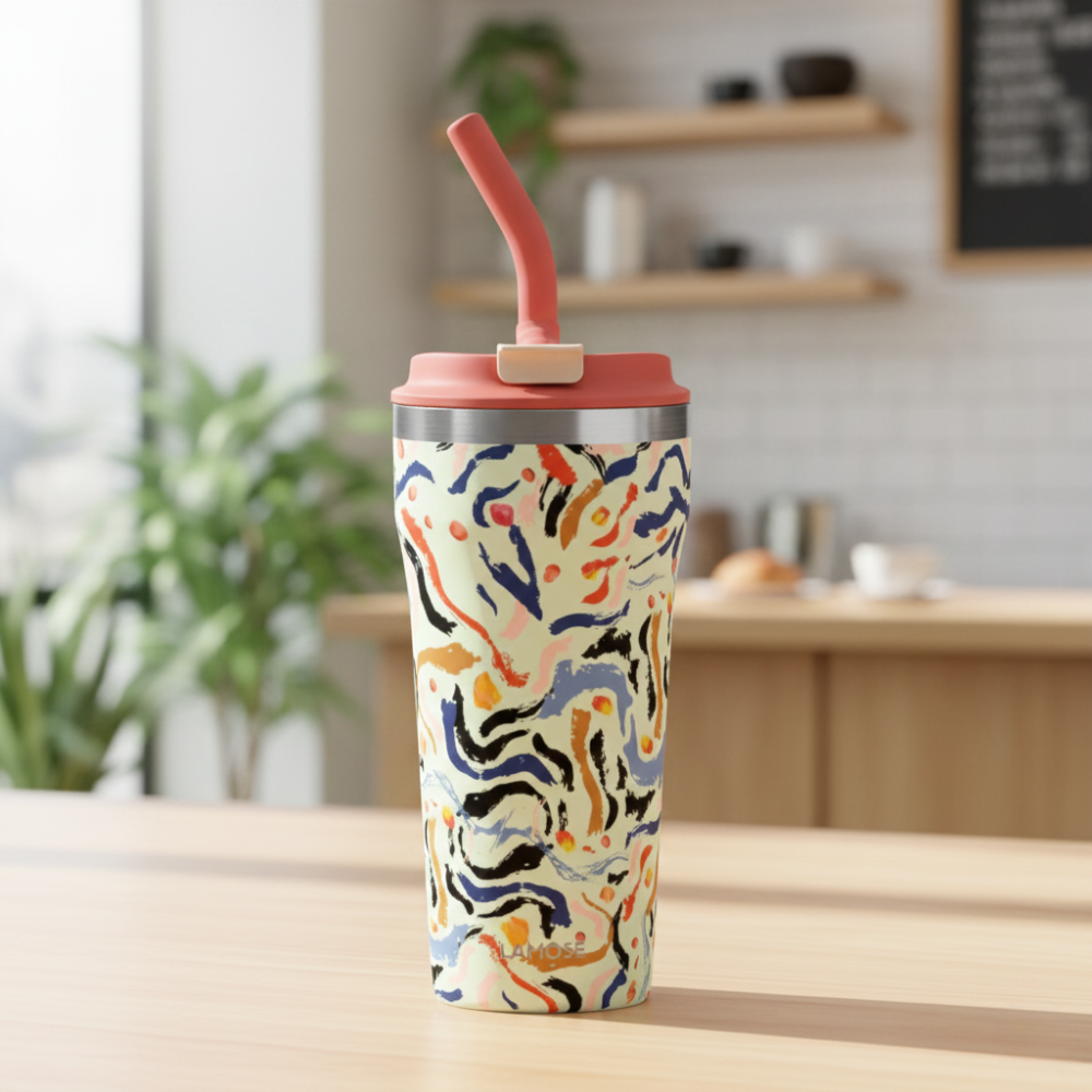LAMOSE Bow 16oz tumbler featuring abstract blue, orange, and pink brushstrokes on beige with a coral lid and straw.