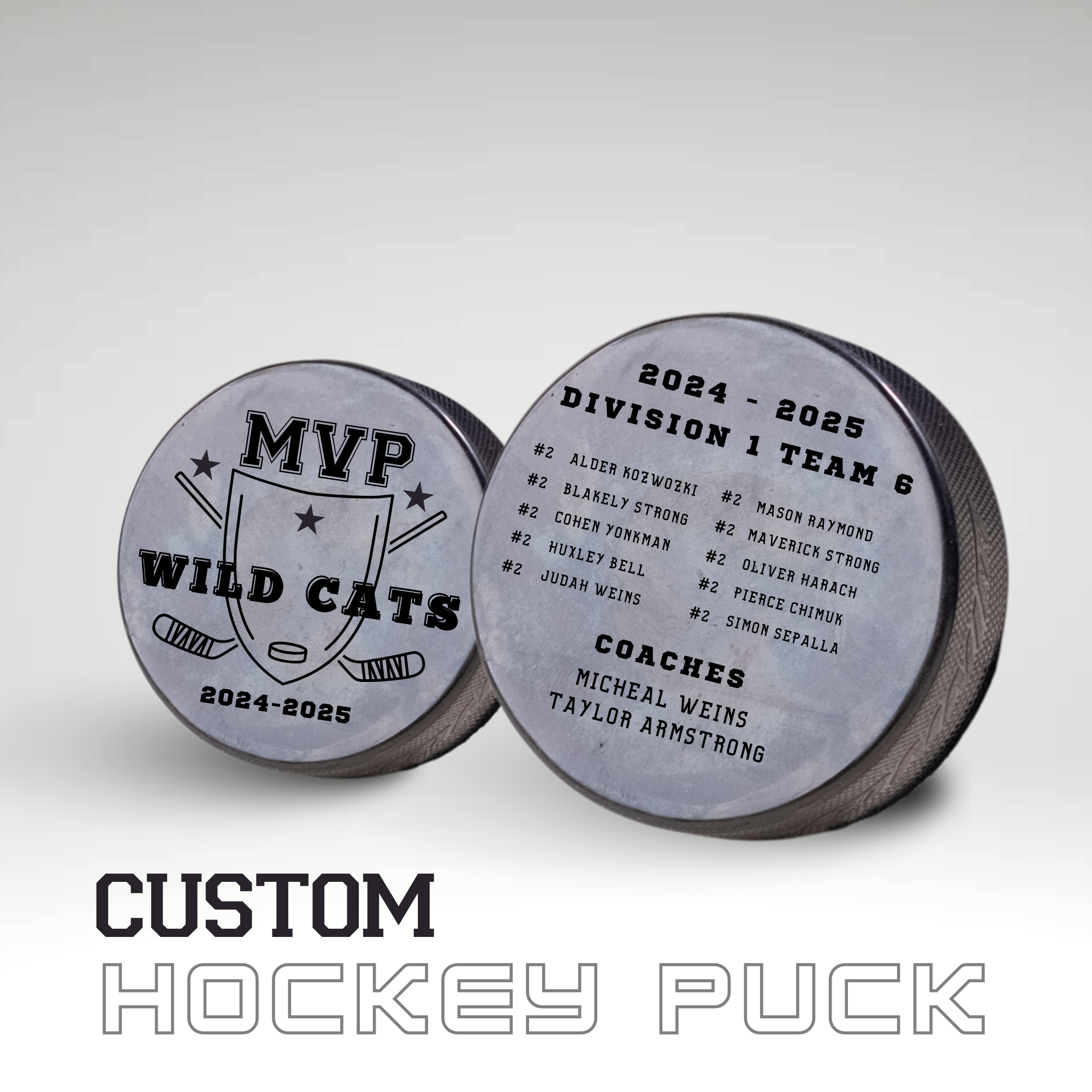 Custom hockey pucks with engraved MVP Wild Cats team logo and 2024-2025 season player roster.