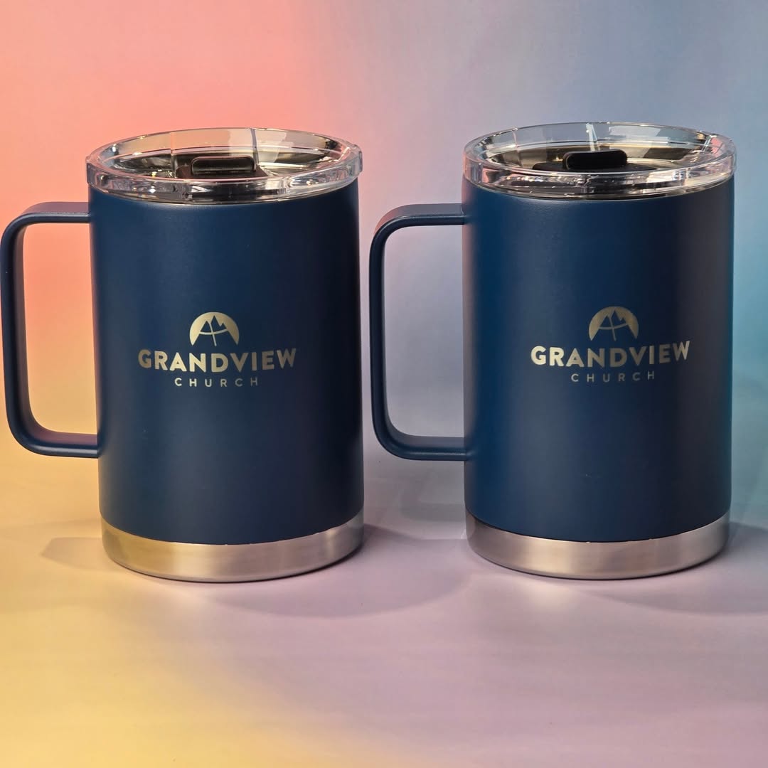 Two LAMOSE Hudson Pro Max 24 oz navy blue insulated mugs with stainless steel base, clear lids, handles, Grandview Church logo.