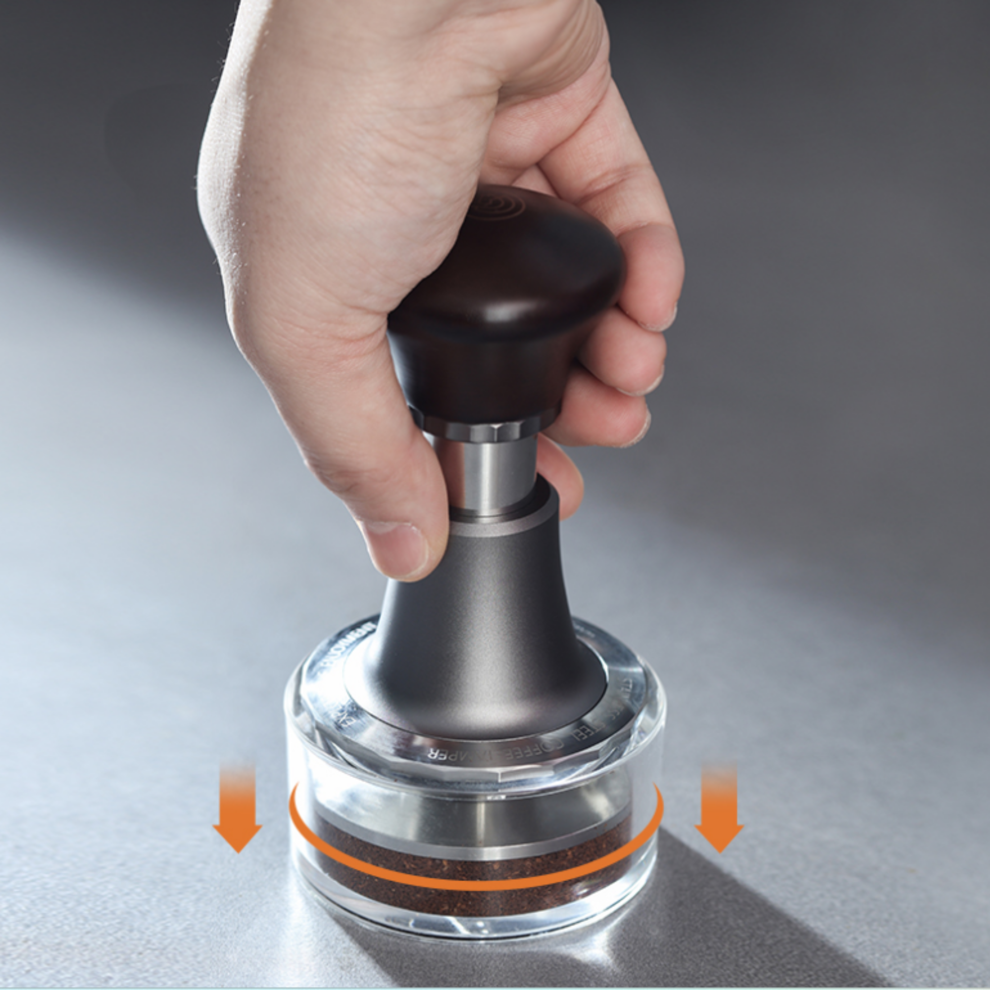Barista using the zeroHero 58mm calibrated espresso tamper with 30lbs pressure control, ensuring even coffee ground compression for optimal extraction. #color_black