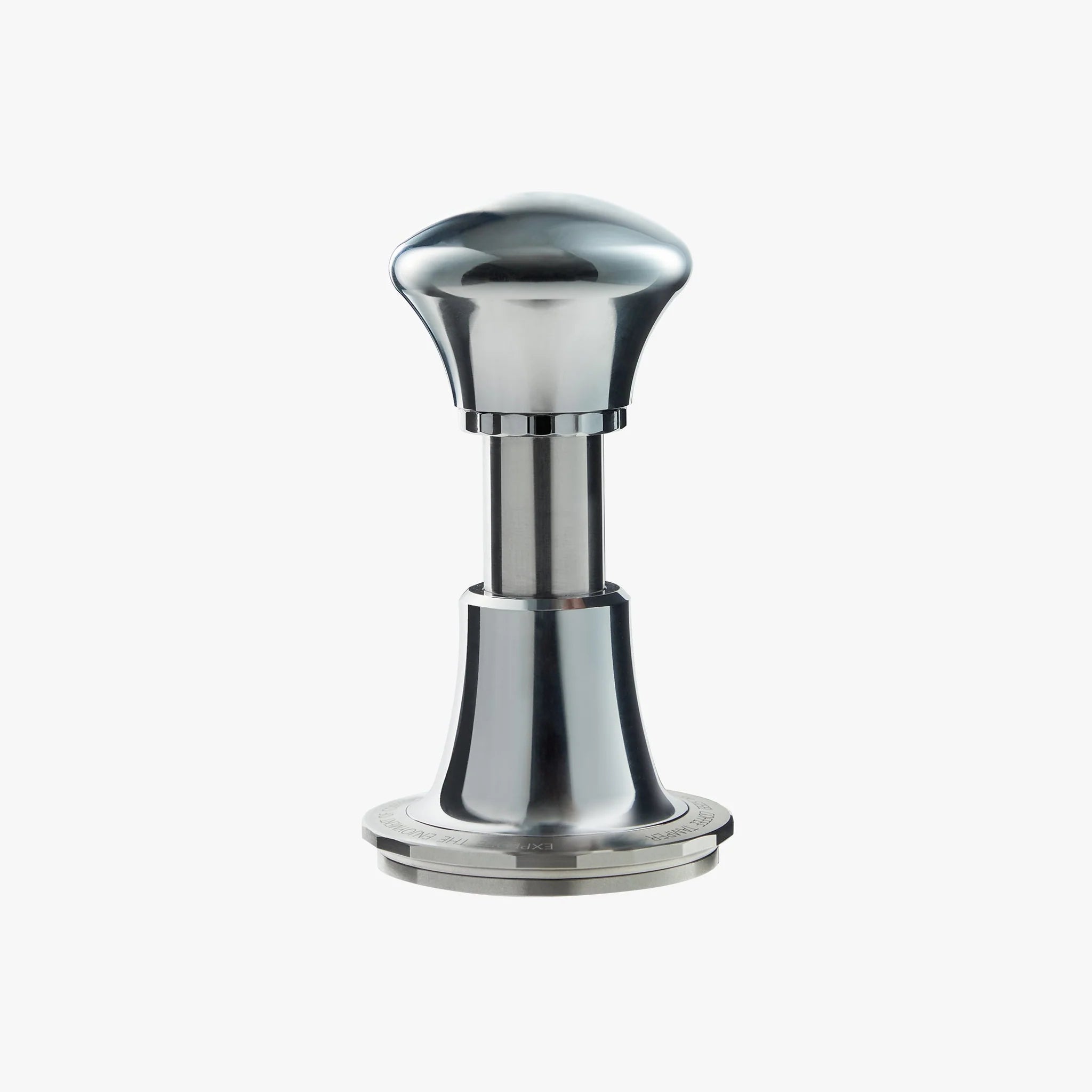 zeroHero 58mm polished stainless steel espresso tamper with an ergonomic handle, designed for even coffee ground compression and consistent espresso extraction. #color_metallic