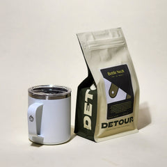 Detour Coffee Roaster Bottleneck Blend - Chocolate, Toffee, Fig Tasting Profile - Filter Balanced Coffee Style - Seasonal Celebration - Consistent Flavor Profile - Smooth Everyday Sipper - Creamy Texture - Approachable Complexity - Baby Raccoon Rescue Inspiration - Learn More on Our Website