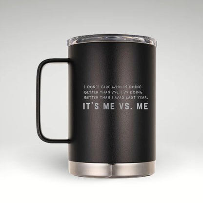 Inspire Your Journey with Every Sip Insulated mug with motivational quote IT'S ME VS. ME on a light background, perfect for personal growth and self-improvement. 