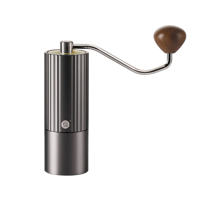Minimalist stainless steel manual coffee grinder with a wooden handle, featuring a sleek, ribbed design and a premium conical burr system