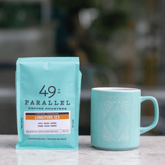 Longitude 123°W Blend by 49th Parallel Coffee Roasters. A medium-light roast with sweet flavors of almond, apple, and raisin. Crafted from the freshest seasonal coffees for a versatile and flavorful experience.